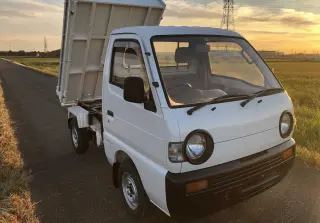 White 1993 Suzuki Carry Dump 4WD mini dump truck for sale, stock KTD-0132 (photo 1)