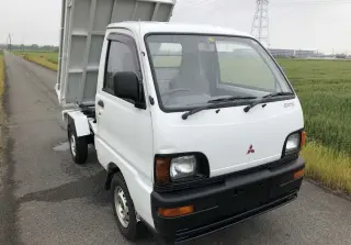 White 1995 Mitsubishi Minicab Dump 4WD mini dump truck for sale, stock KTD-0142 (photo 1)