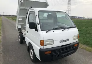 White 1995 Suzuki Carry Dump 4WD mini dump truck for sale, stock KTD-0144 (photo 1)