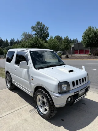 2000 Suzuki Jimny Wild Wind Turbo 4WD — photo 1 of 12