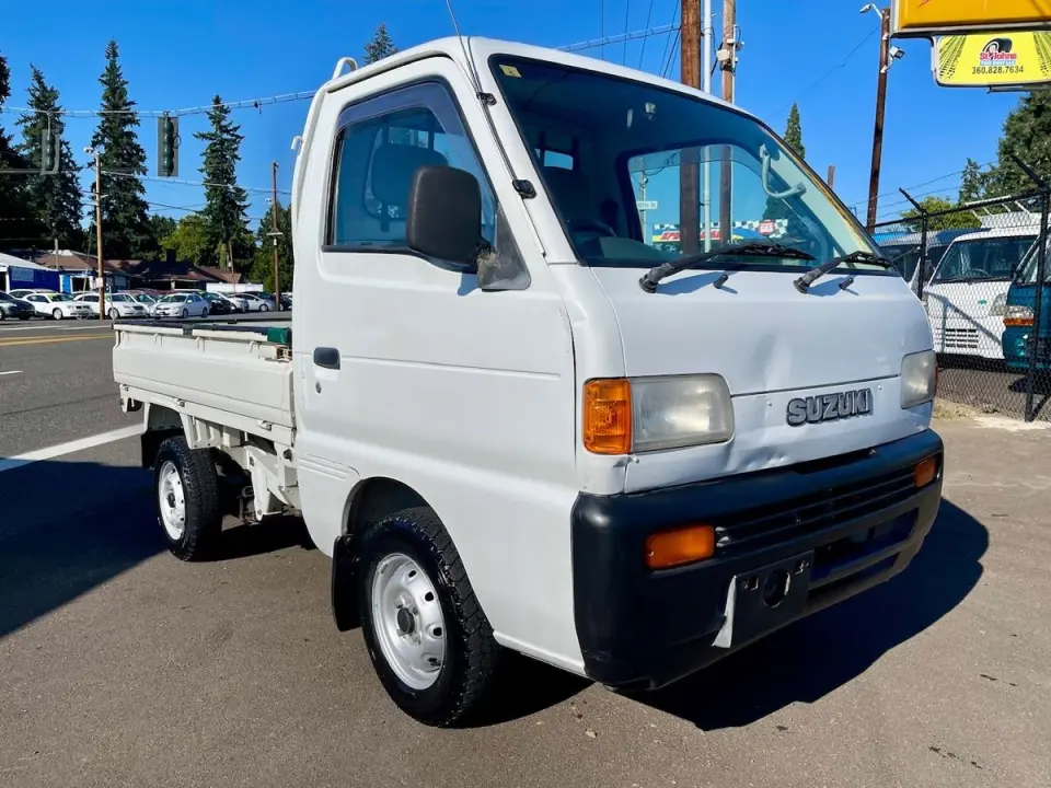 1997 Suzuki Carry SD Dump 4WD, 2Hi-4Hi, EL Gear, 5MT, Diff Lock — White Mini Dump Trucks, photo 1 of 9