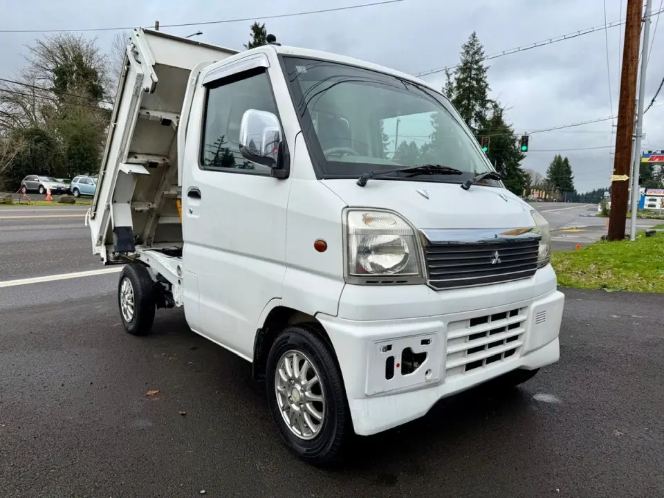 2000 Mitsubishi Minicab HD Dump 4WD, 2Hi-4Hi-4Lo, AC, PS, 5MT, LSD — Passo White Mini Dump Trucks, photo 1 of 9